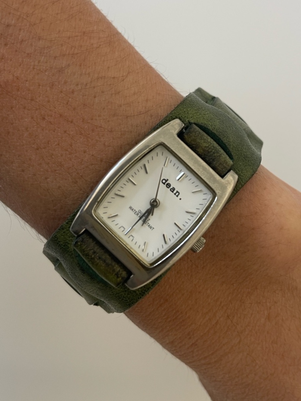 dean. Silver Rectangular Watch on Green Leather Cuff Strap